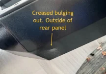 Rear window panel damaged (outside vantage).webp
