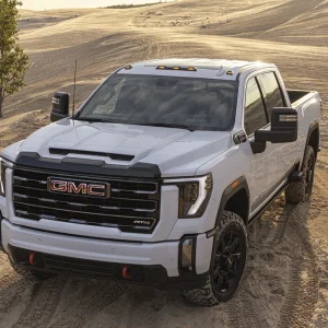 2024-GMC-Sierra-HD-AT4-Press-Photos-Exterior-006-front-three-quarters.jpg